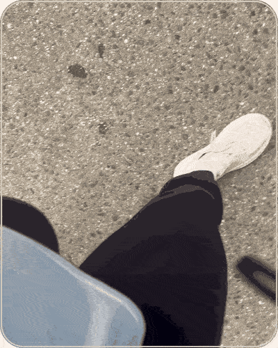 A sidewalk view mid-walk